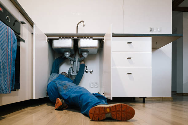 Professional Drain Cleaning technician working in Cataumet, MA